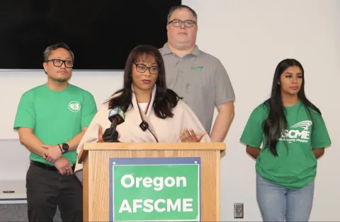 Congresswoman Janelle Bynum (OR-05) stands with Oregon AFSCME members at a press conference. 